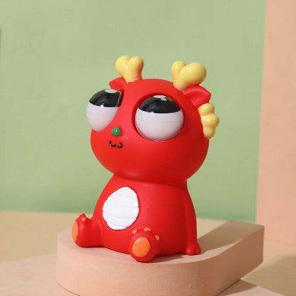 Funny eye popping fidget dragon