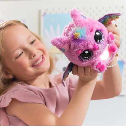 Child cuddling Hatchimals Alive Pufficorn