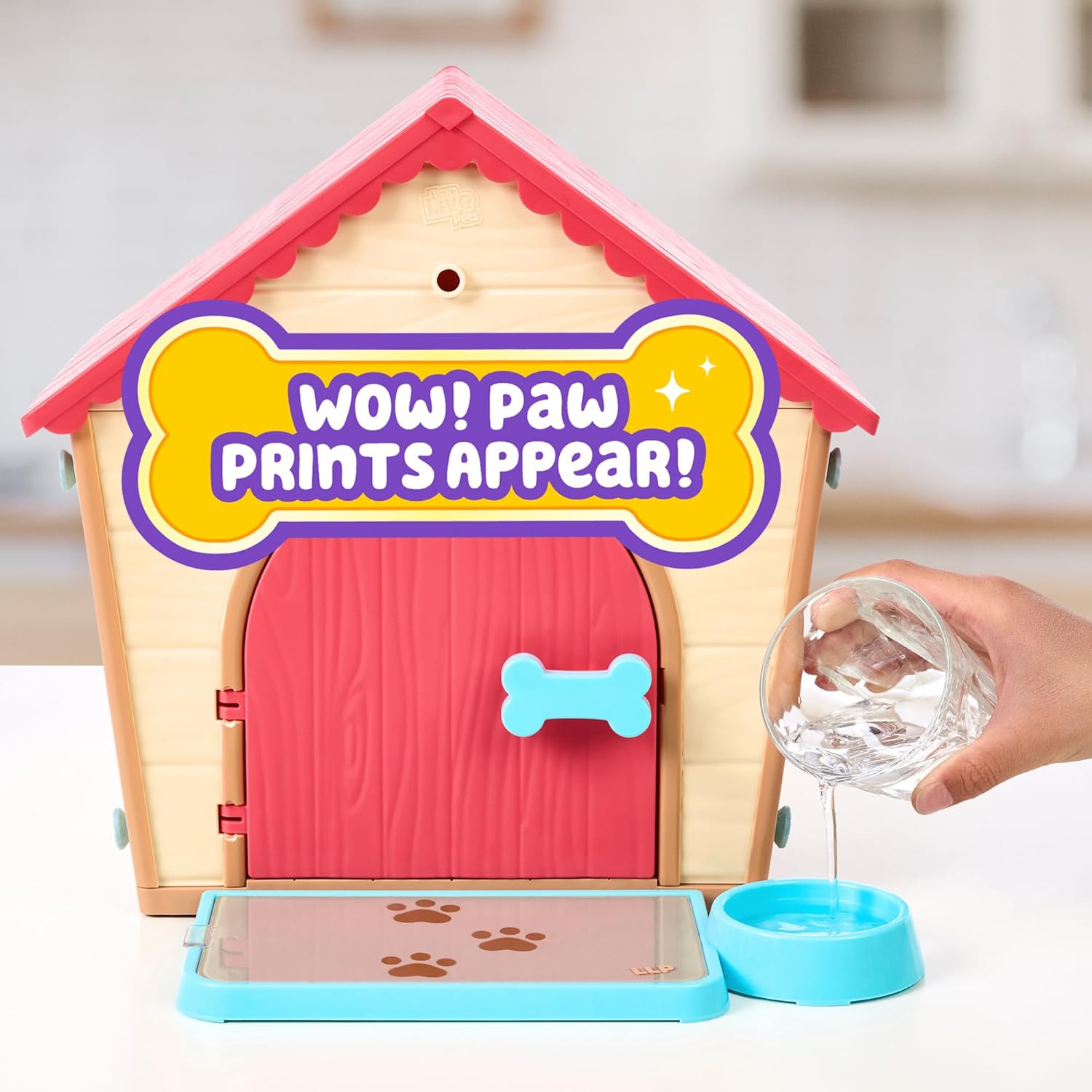 Interactive plush puppy with buildable kennel