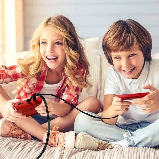Children enjoying the SUP retro game console