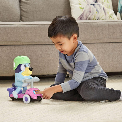Child playing with VTech Bluey Scooter Time