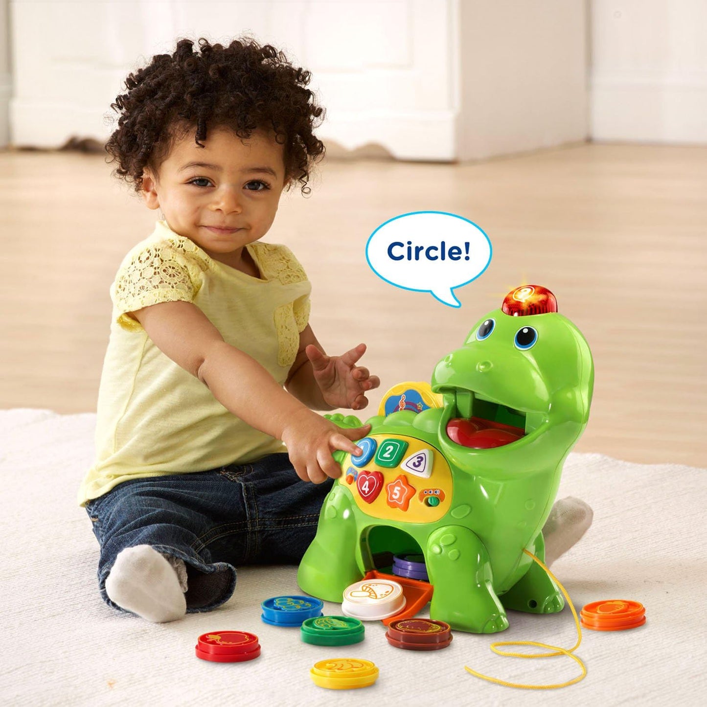 Baby learning shapes with VTech Chomp and Count Dino